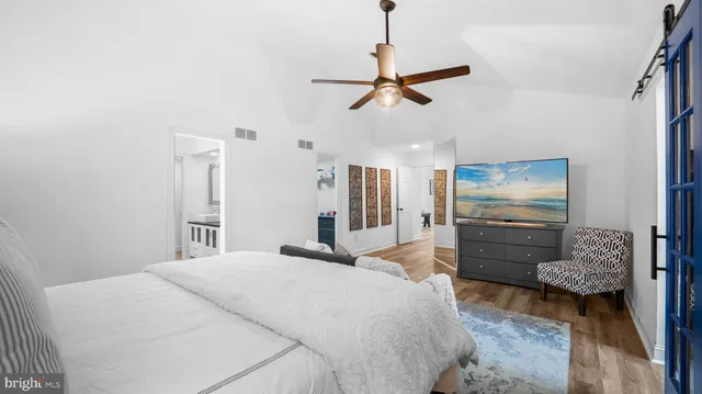 a bedroom with a bed and furniture