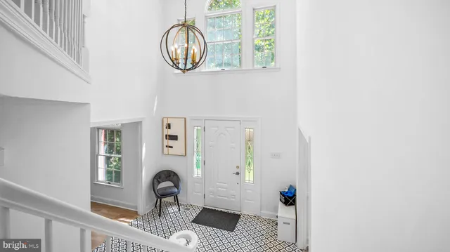 a front view of a house with large windows