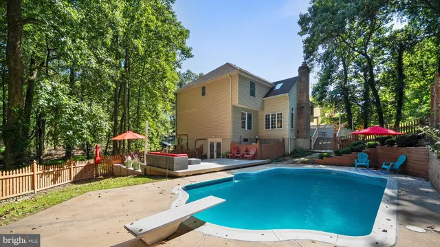 an outdoor space with furniture and umbrella