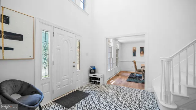 a room with furniture and a rug