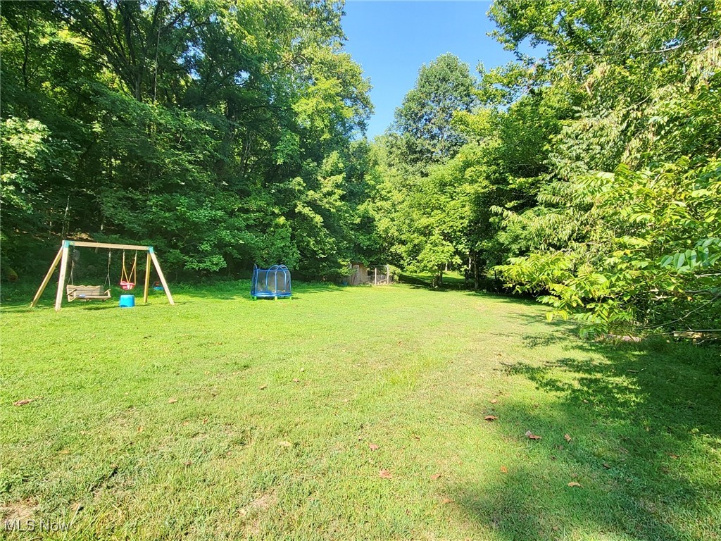 5103 Rte 10 Barboursville, WV 25504 - Photo 6 of 16 View of yard featuring a trampoline and a playground