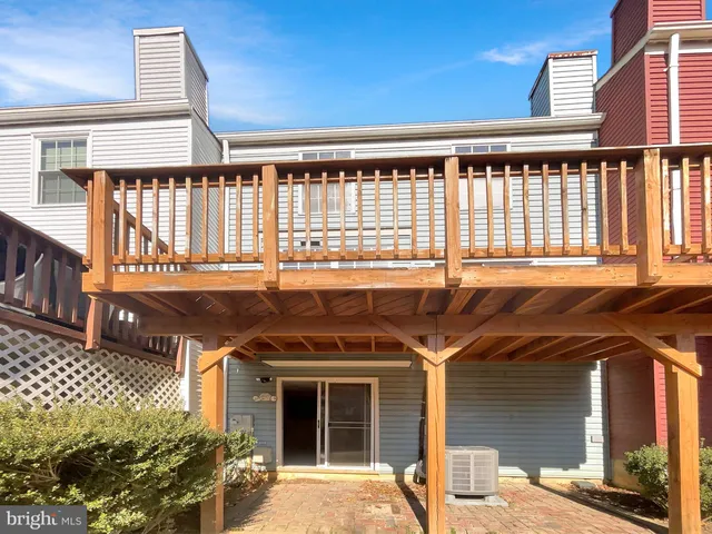 front view of a house with a large window