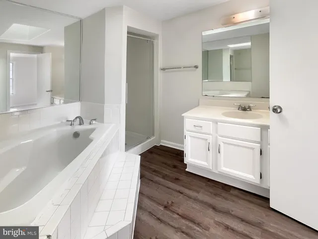 a bathroom with a sink and a bathtub