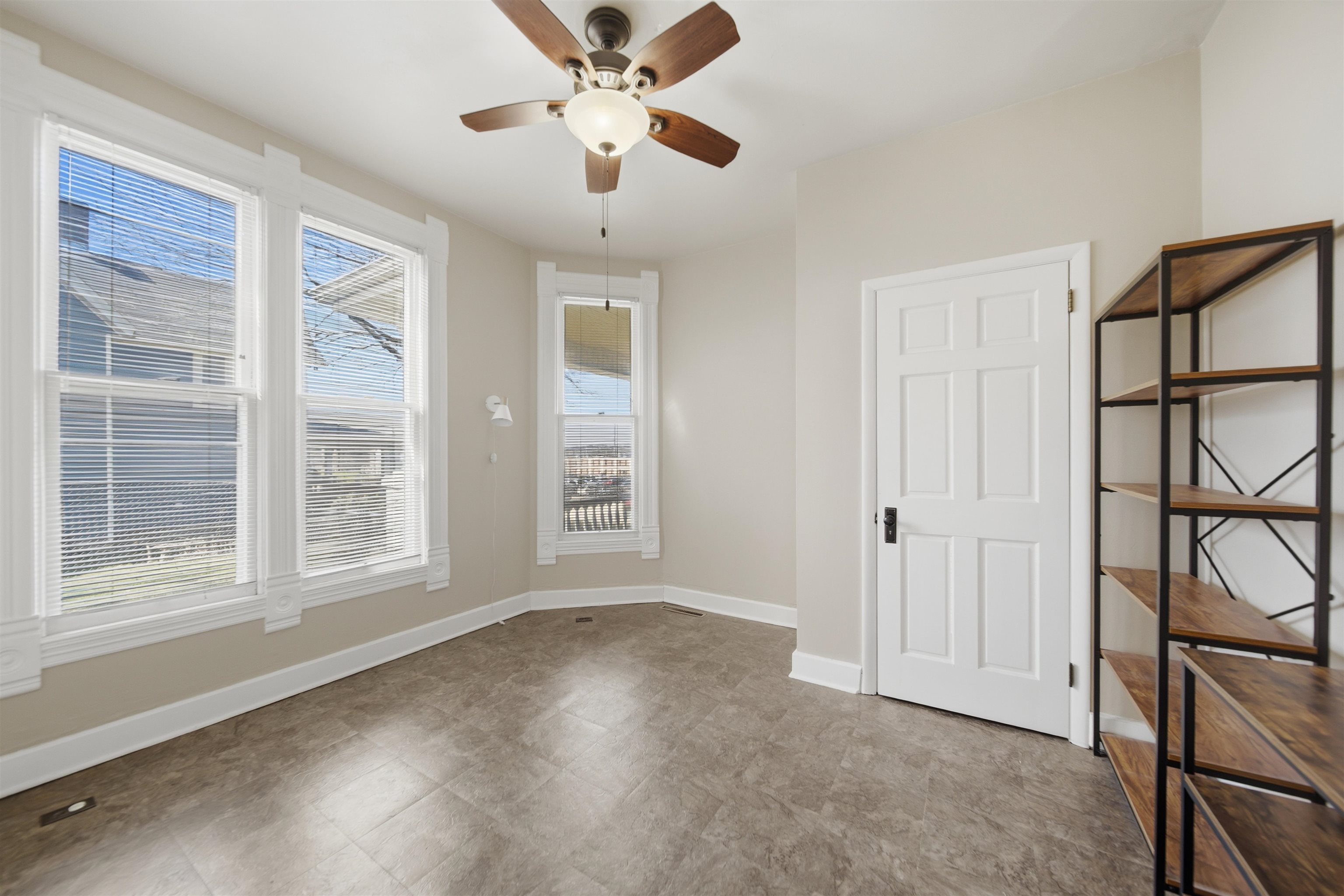 324 East 2nd Street Dixon, IL 61021 - Photo 12 of 25 a view of an empty room with a window
