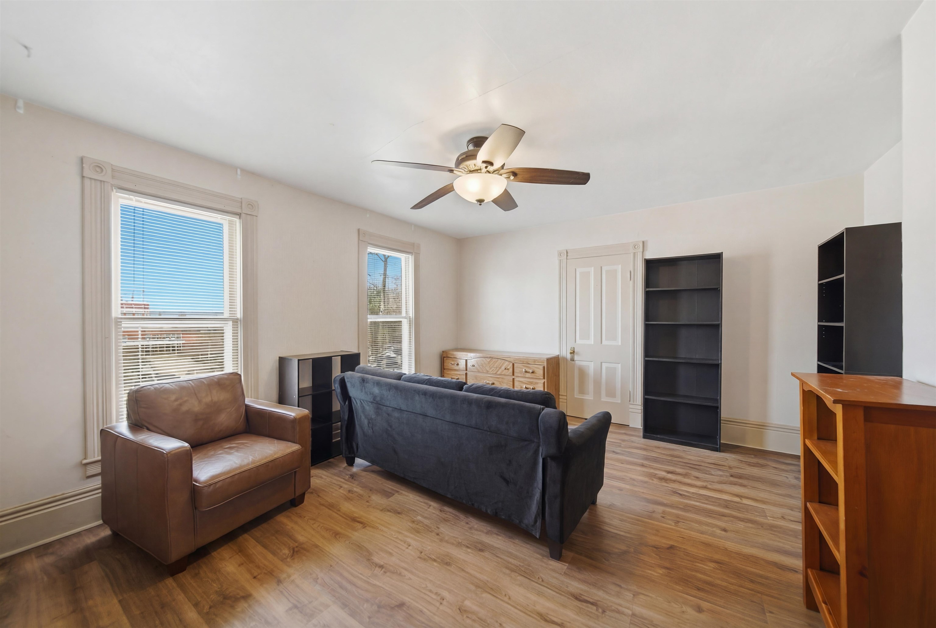 324 East 2nd Street Dixon, IL 61021 - Photo 17 of 25 a living room with furniture and a ceiling fan