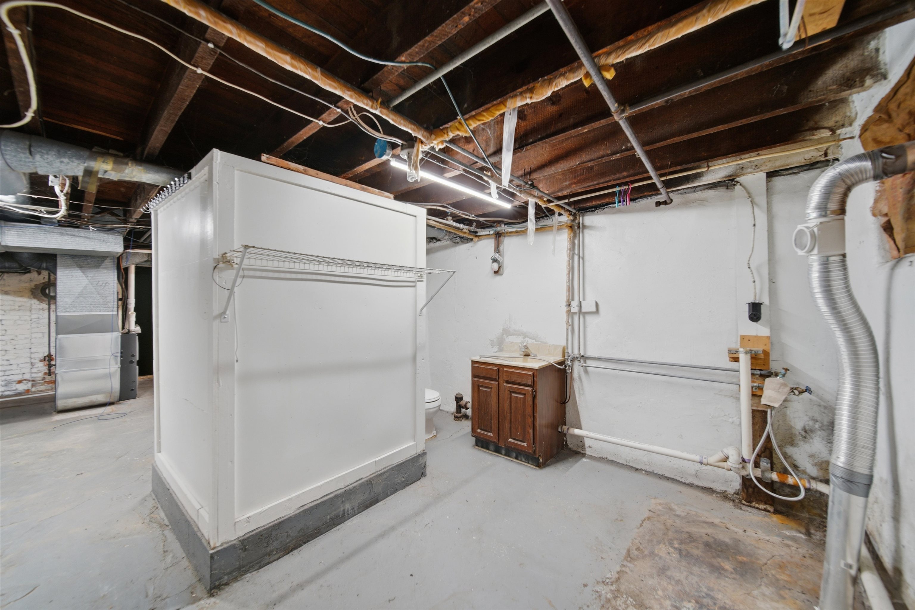 324 East 2nd Street Dixon, IL 61021 - Photo 21 of 25 a view of storage and utility room with refrigerator