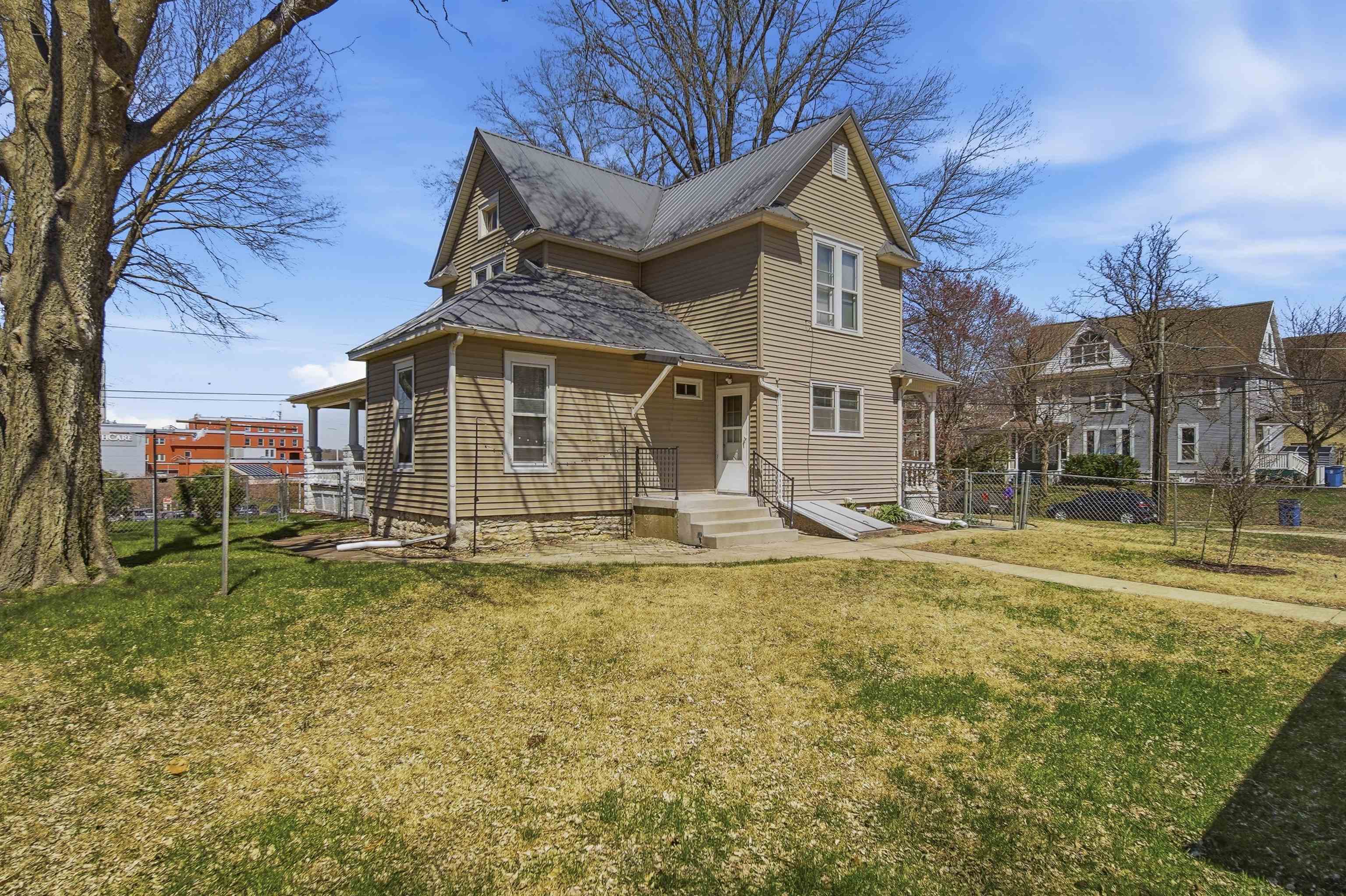 324 East 2nd Street Dixon, IL 61021 - Photo 23 of 25 a view of a house with a yard