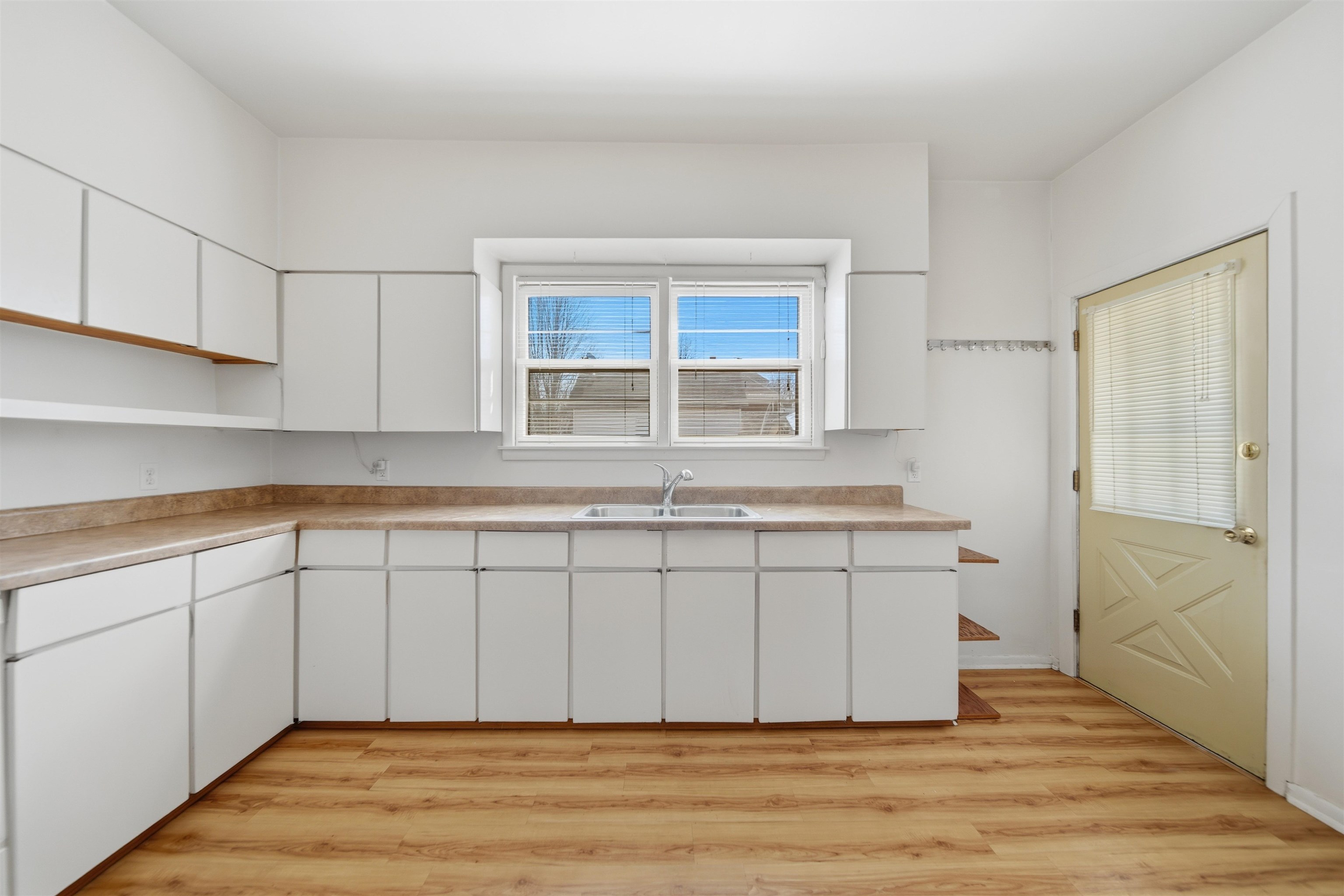 324 East 2nd Street Dixon, IL 61021 - Photo 10 of 25 a view of cabinets with wooden floor and cabinet