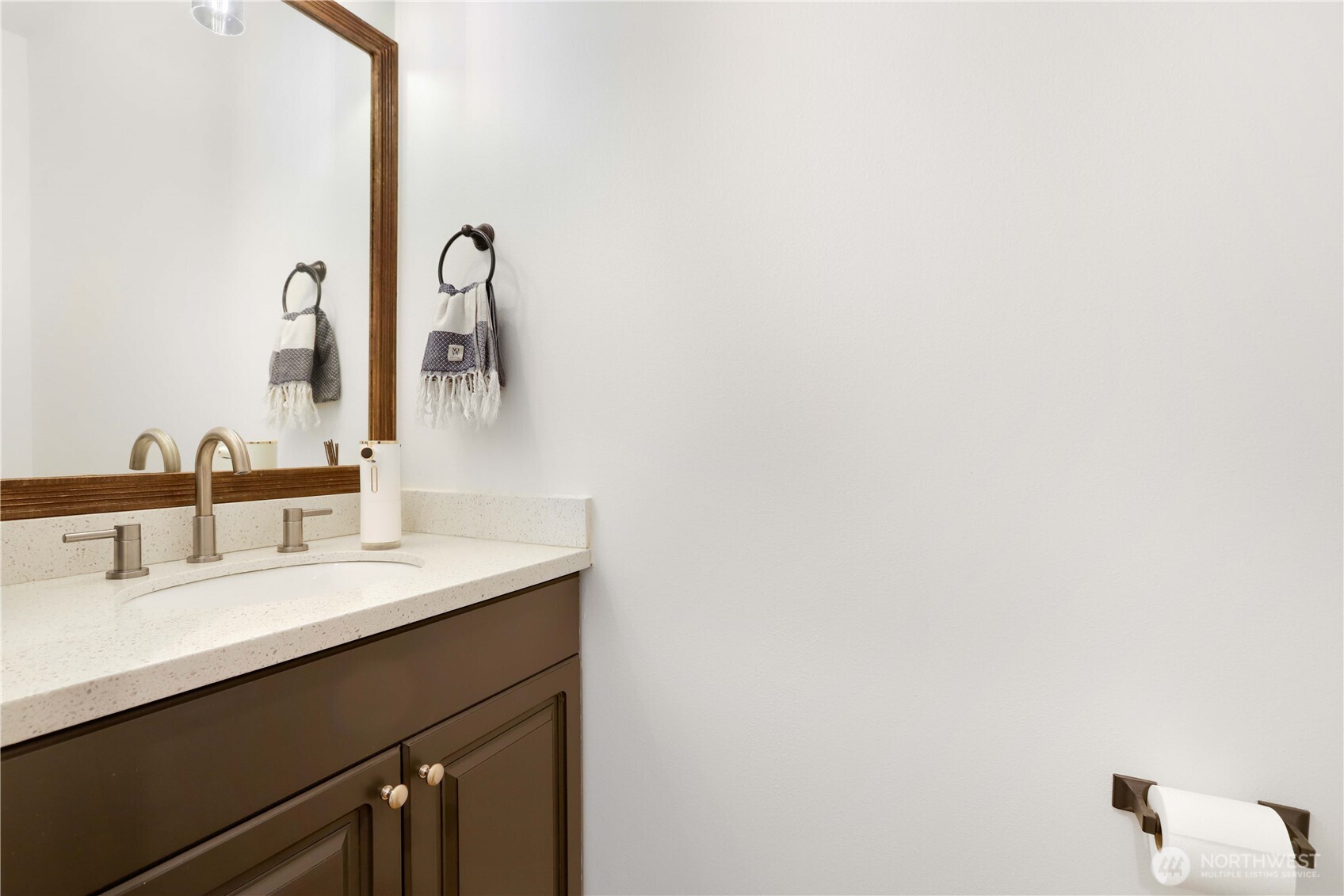 7531 148th Place Southeast Snohomish, WA 98296 - Photo 15 of 29 a bathroom with a sink and a mirror