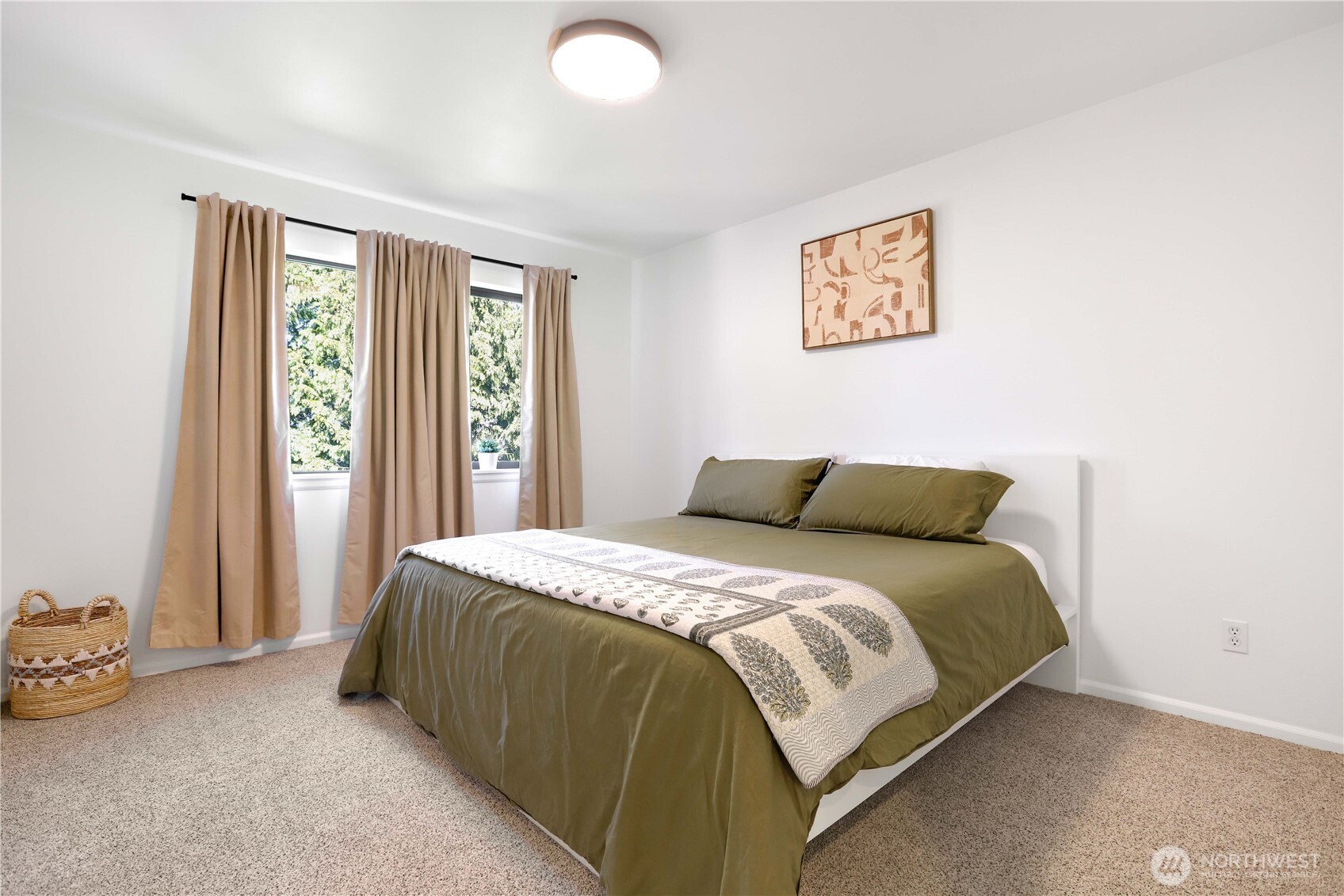 7531 148th Place Southeast Snohomish, WA 98296 - Photo 21 of 29 a spacious bedroom with a bed and a window