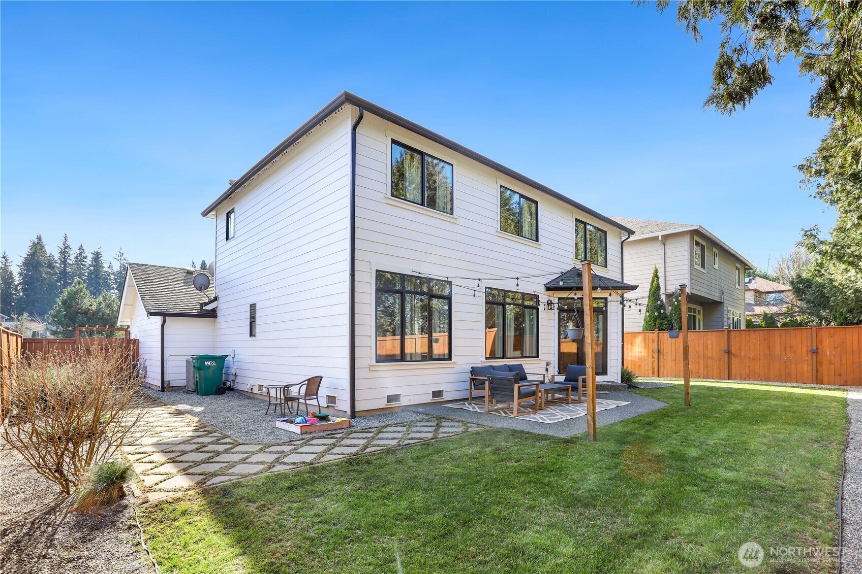 7531 148th Place Southeast Snohomish, WA 98296 - Photo 25 of 29 a backyard of a house with table and chairs