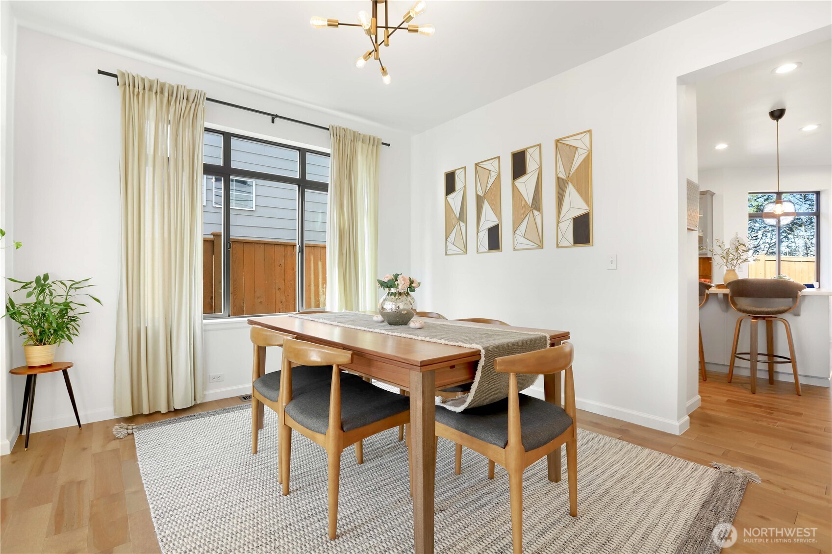 7531 148th Place Southeast Snohomish, WA 98296 - Photo 10 of 29 a view of a dining room with furniture and wooden floor