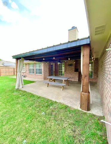 a front view of a house with yard