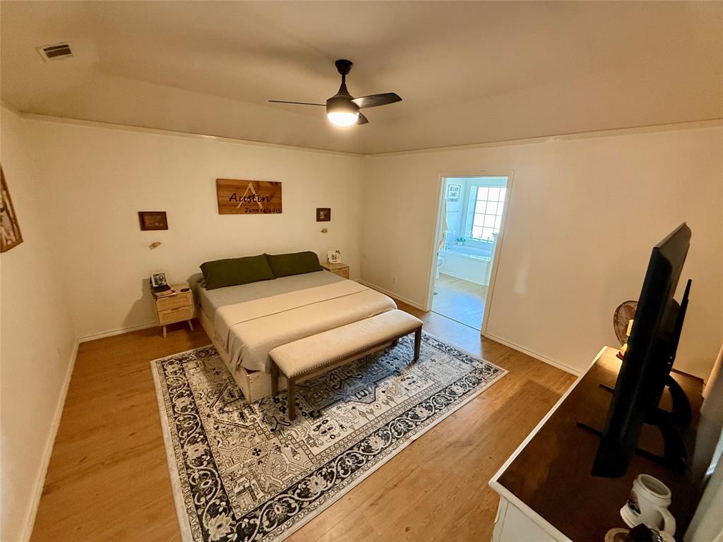 2 Broadmoor Court Bonham, TX 75418 - Photo 6 of 22 a living room with a rug
