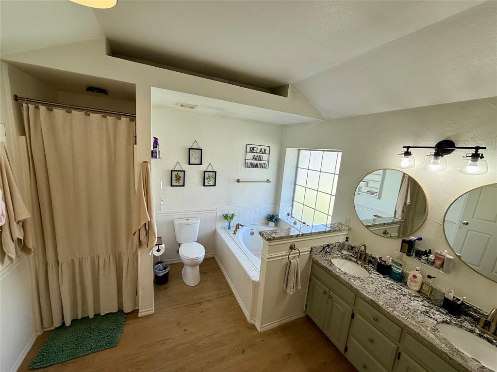 2 Broadmoor Court Bonham, TX 75418 - Photo 8 of 22 a living room with furniture and a window