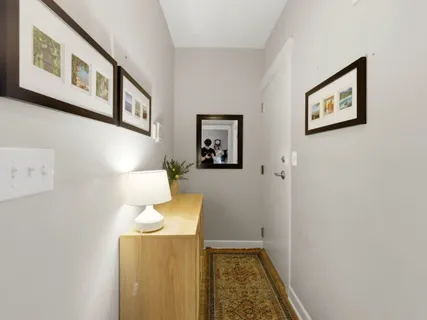 a bedroom with a bed and furniture