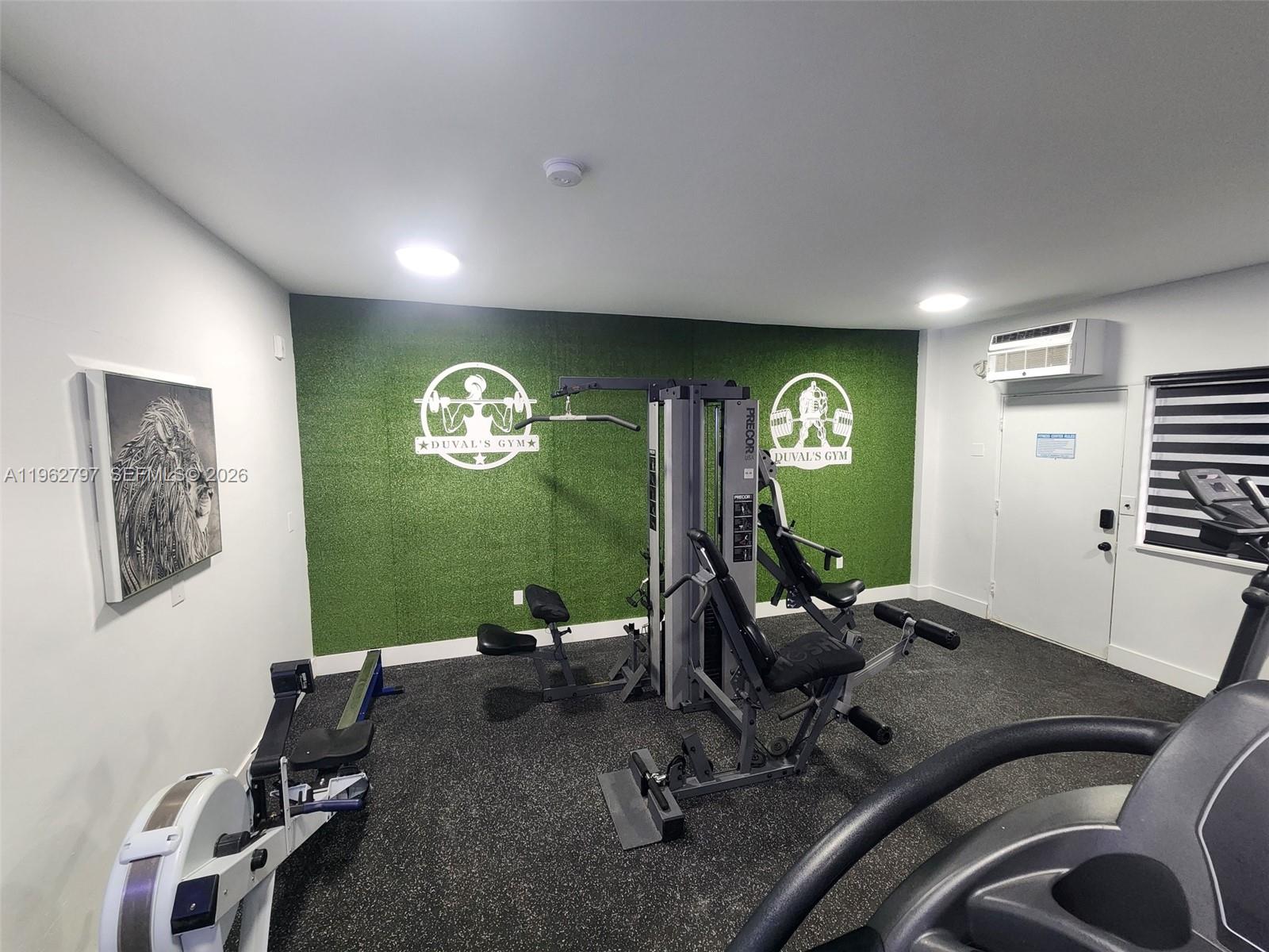 2101 Normandy Drive, Unit 204 Miami Beach, FL 33141 - Photo 17 of 43 a view of a room with gym equipment