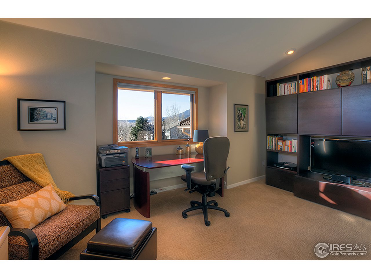 3180 Redstone Road Boulder, CO 80305 - Photo 11 of 24 a view of a workspace with furniture and a window