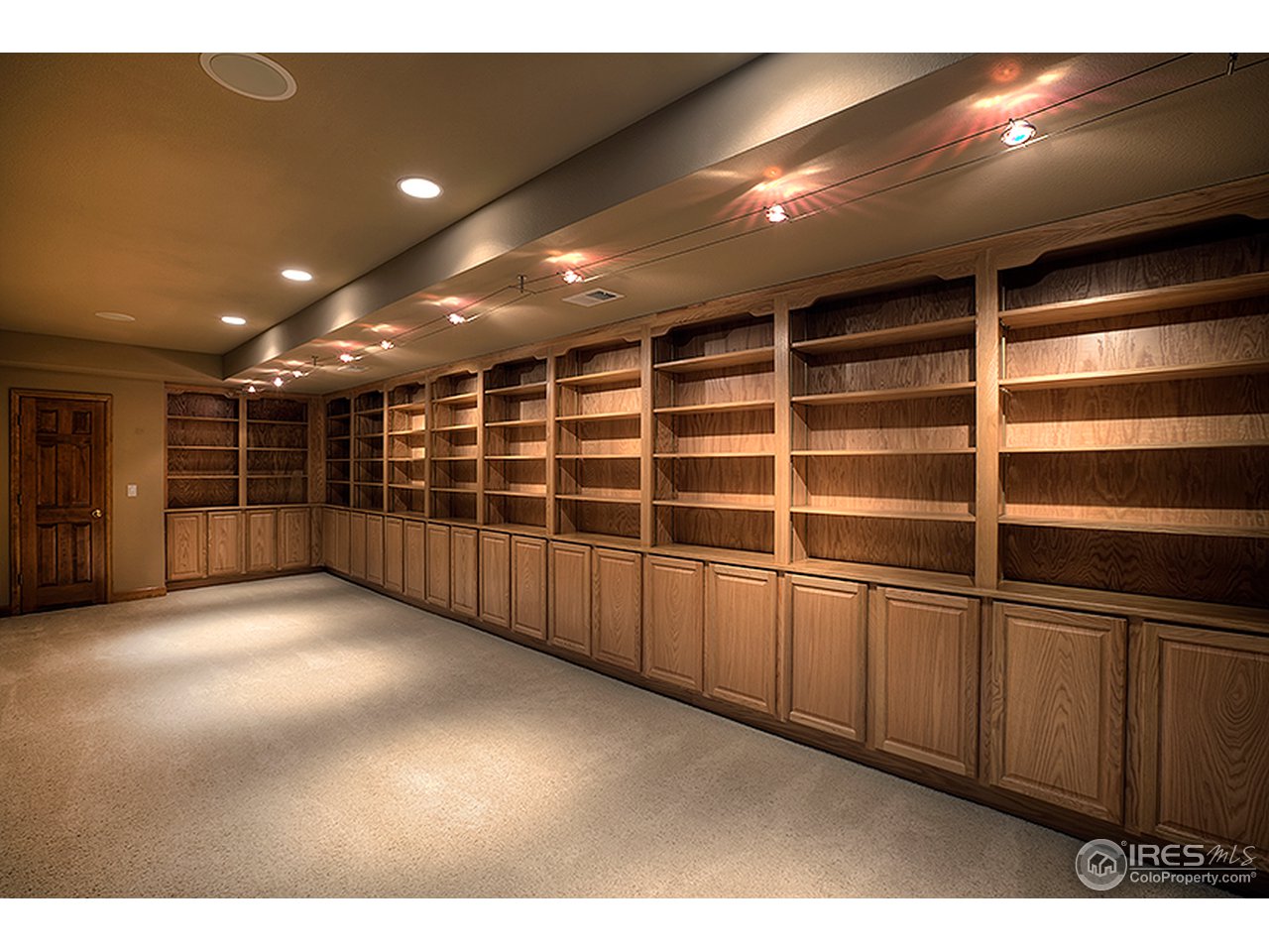 3180 Redstone Road Boulder, CO 80305 - Photo 13 of 24 a view of an empty room with wooden cabinets
