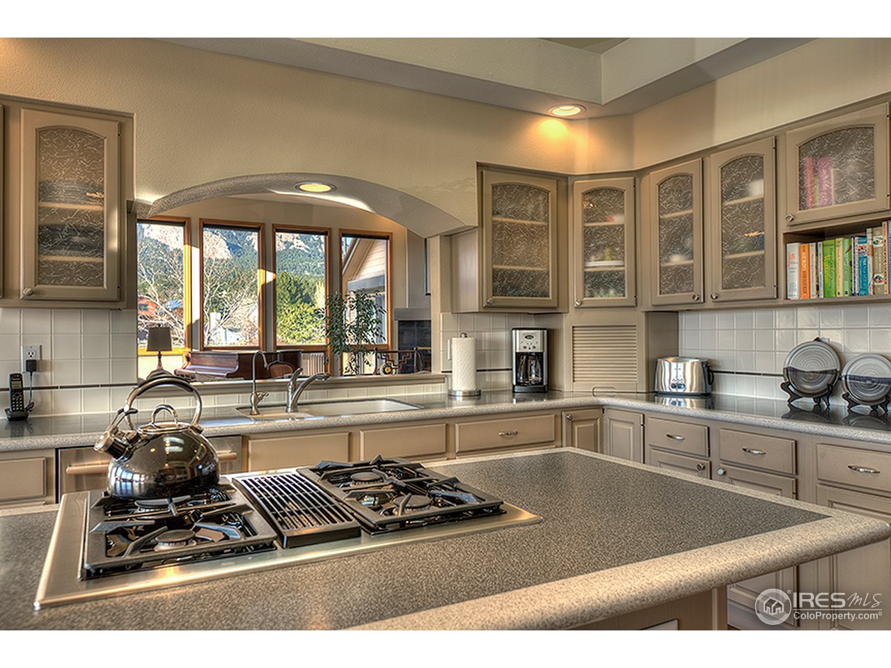 3180 Redstone Road Boulder, CO 80305 - Photo 14 of 24 a kitchen with stainless steel appliances granite countertop a stove and a sink