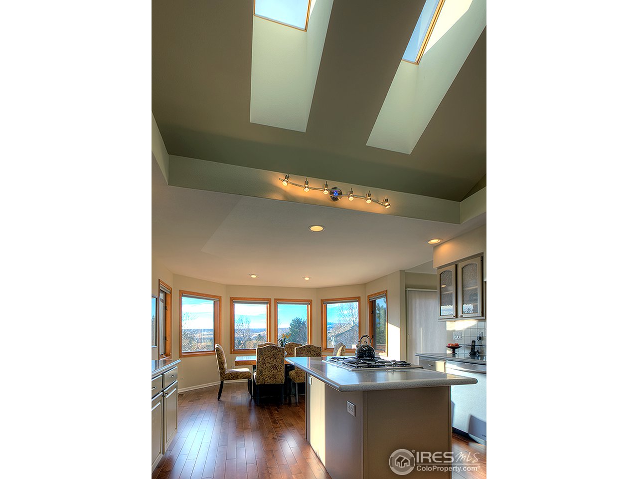 3180 Redstone Road Boulder, CO 80305 - Photo 15 of 24 a kitchen with a sink and living room