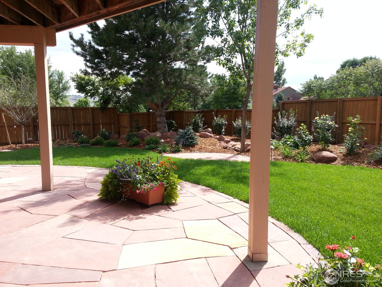 3180 Redstone Road Boulder, CO 80305 - Photo 22 of 24 a view of a garden with patio