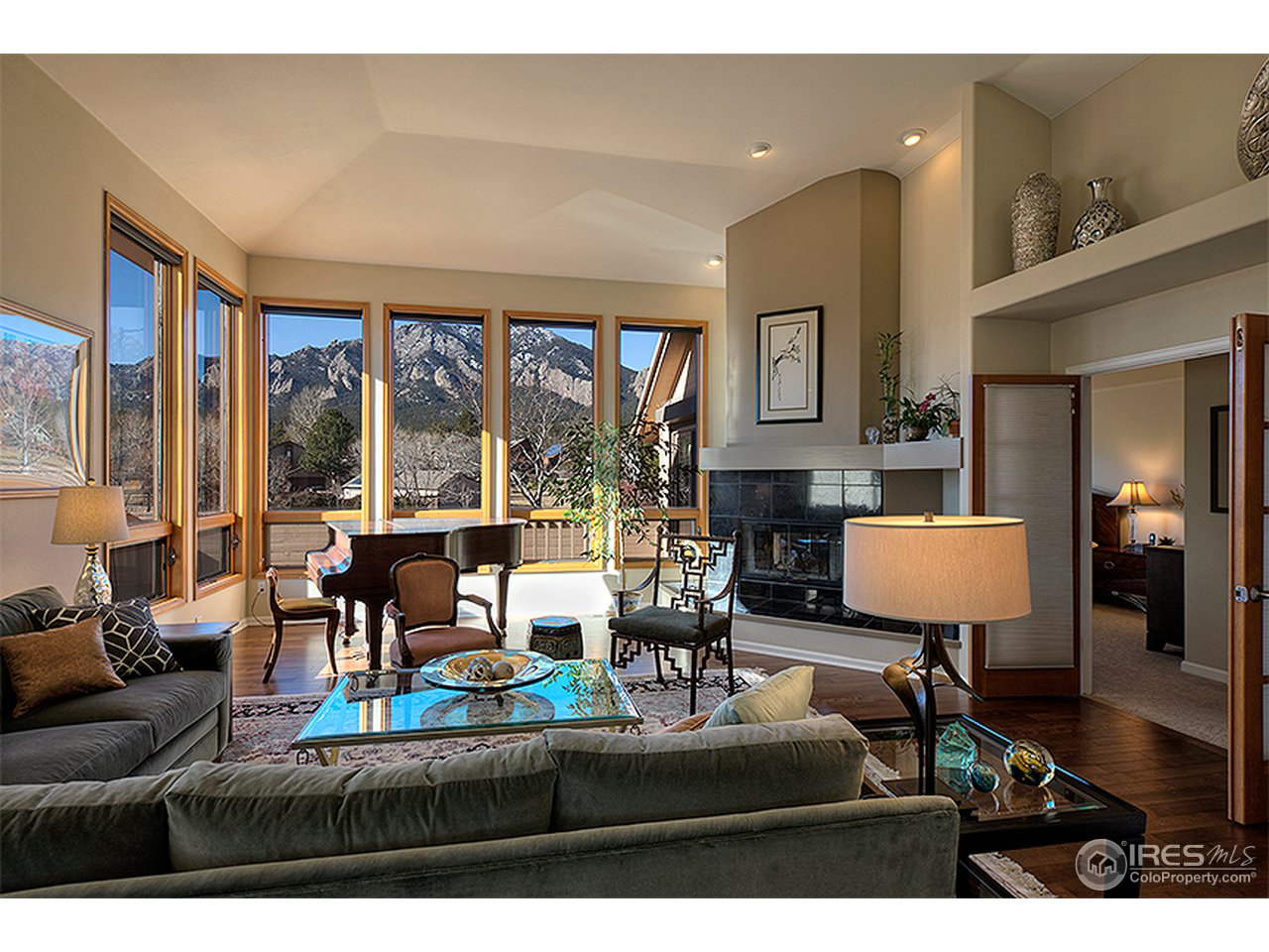 3180 Redstone Road Boulder, CO 80305 - Photo 3 of 24 a living room with furniture and a lamp