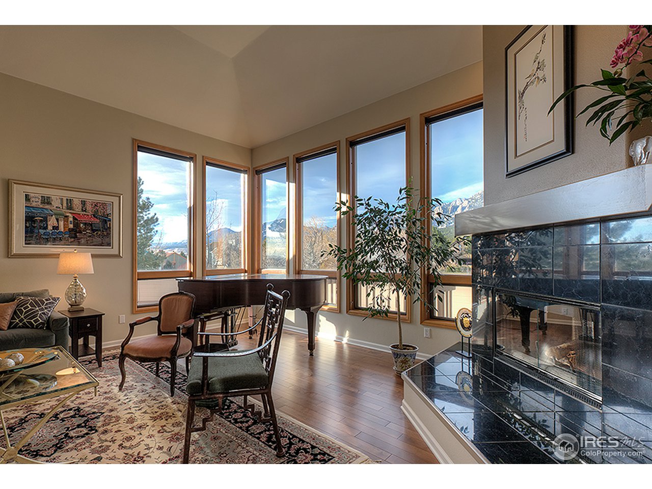 3180 Redstone Road Boulder, CO 80305 - Photo 4 of 24 a living room with furniture and a floor to ceiling window