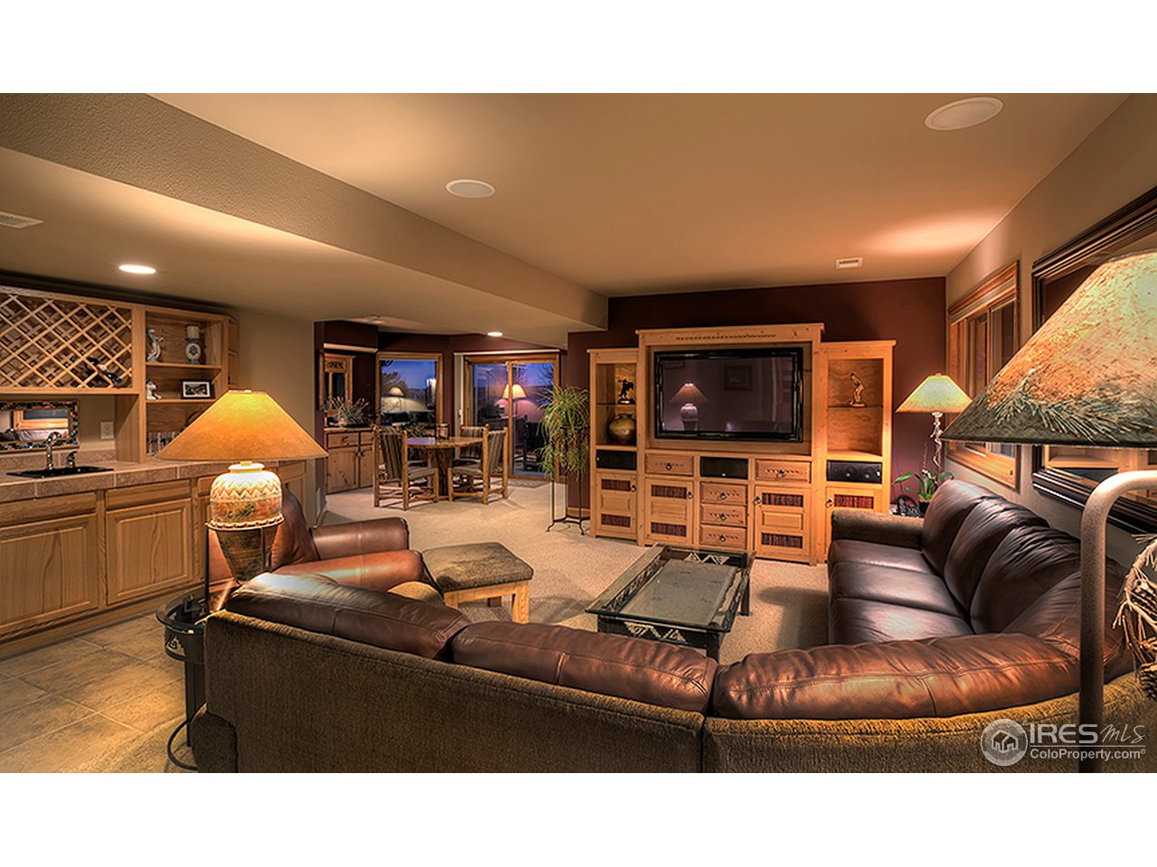 3180 Redstone Road Boulder, CO 80305 - Photo 9 of 24 a living room with furniture and a flat screen tv
