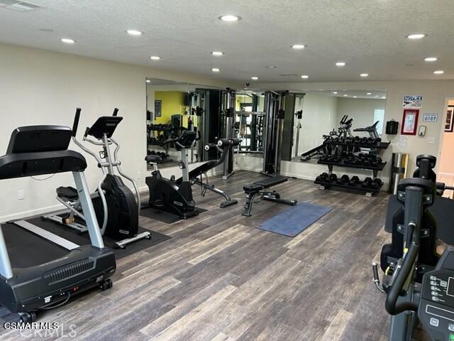 24303 Woolsey Canyon Road, Unit 26 Canoga Park, CA 91304 - Photo 27 of 28 a view of a room with gym equipment