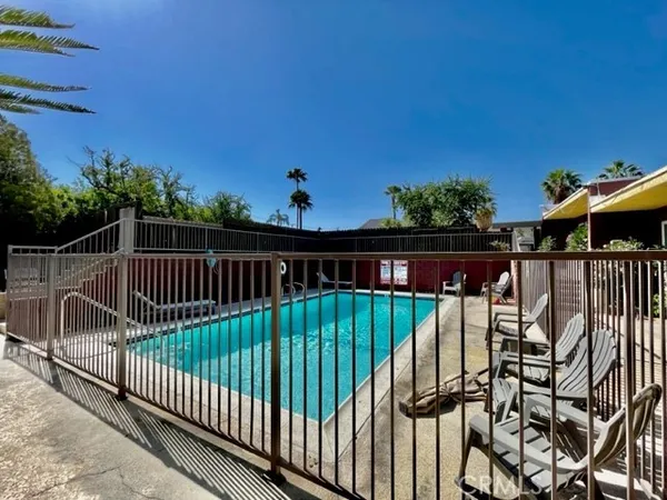 a view of deck with wooden floor and outdoor seating