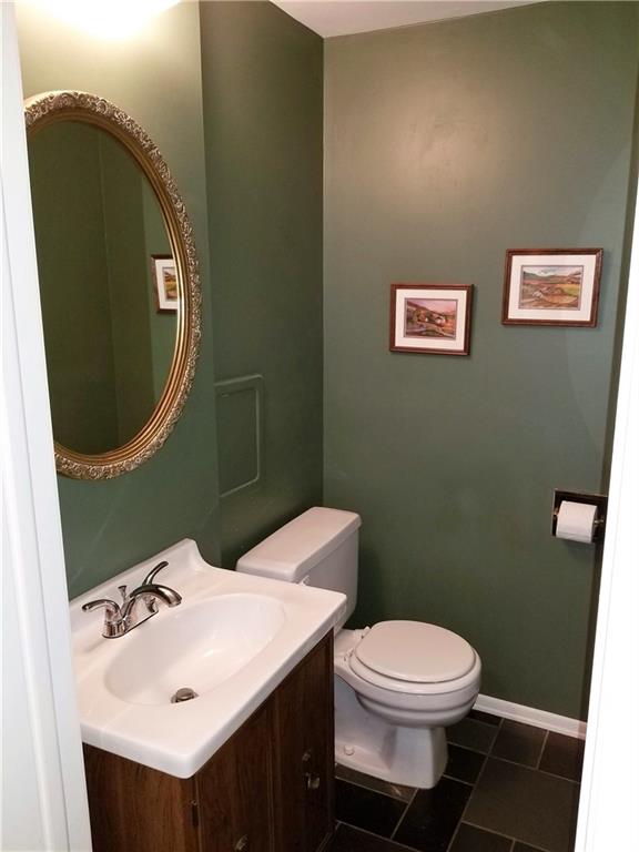 The first floor powder room, complete with functioning laundry chute.