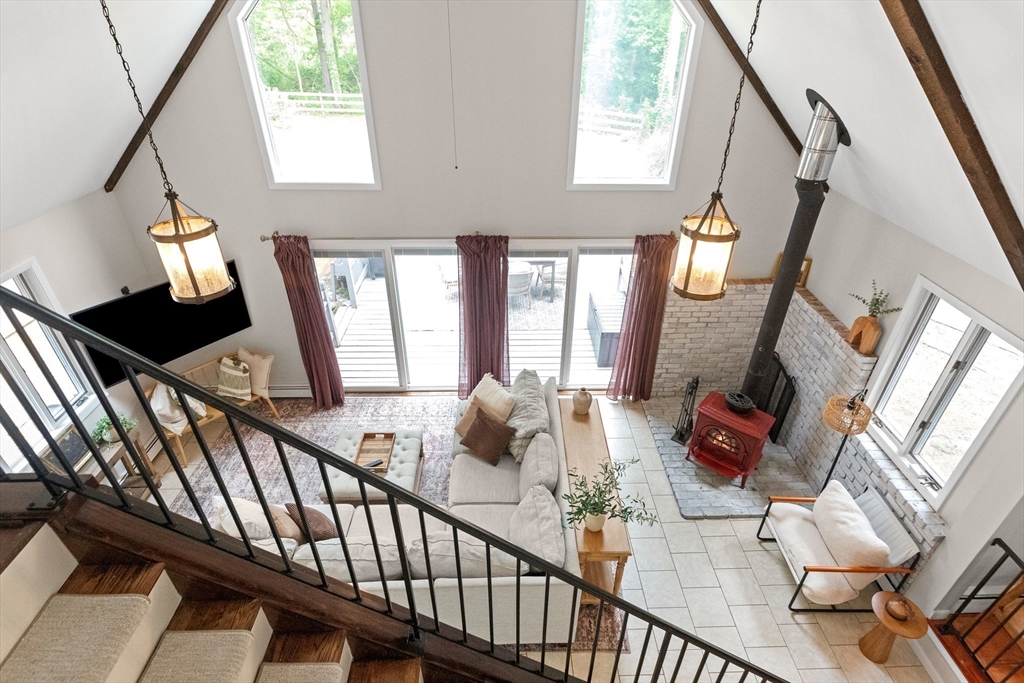 9 School Street Boxford, MA 01921 - Photo 24 of 38 a view of entryway livingroom and hall with wooden floor