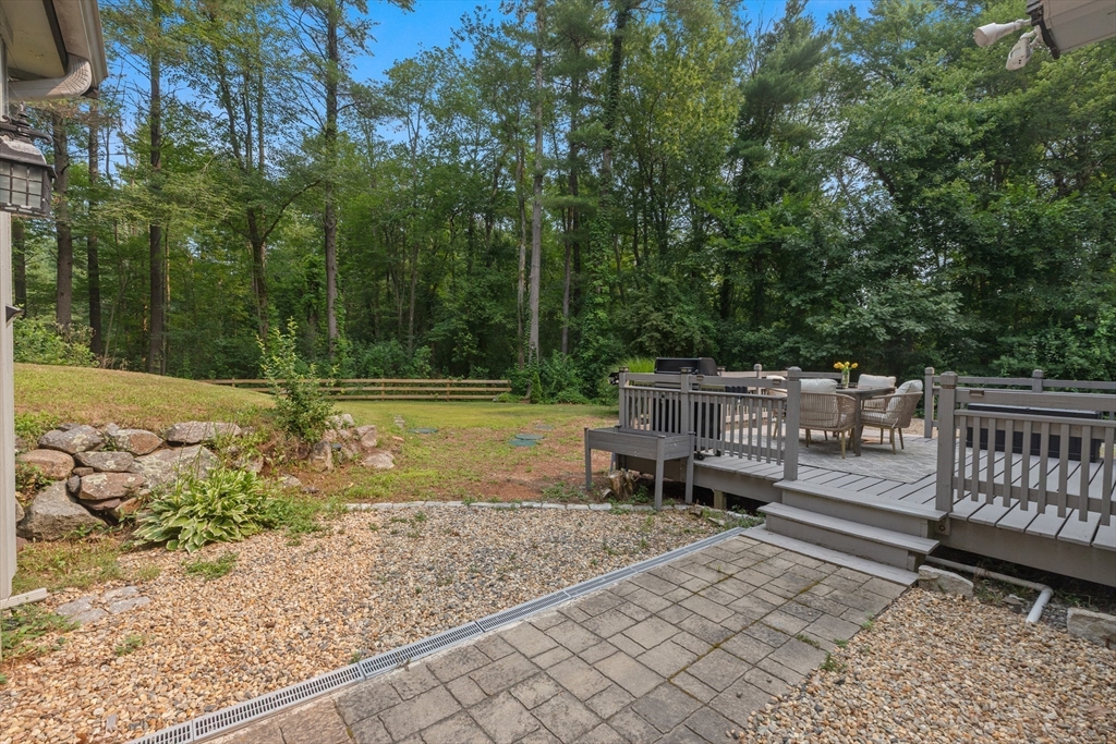 9 School Street Boxford, MA 01921 - Photo 28 of 38 a view of a bench in a backyard