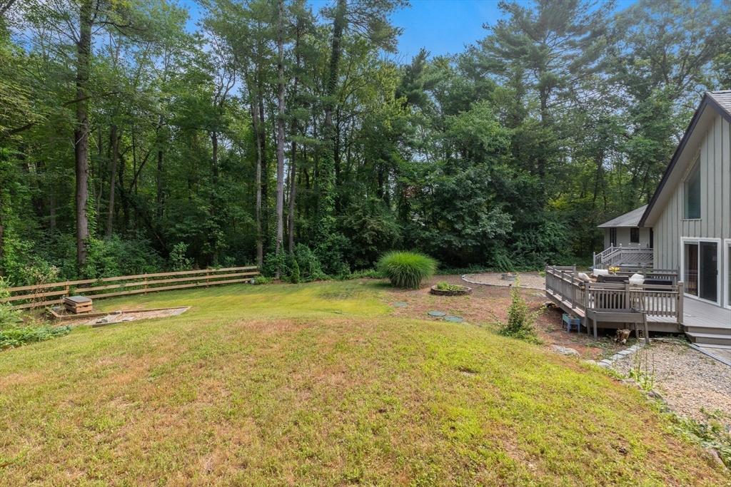 9 School Street Boxford, MA 01921 - Photo 32 of 38 a view of a swimming pool with a lounge chair