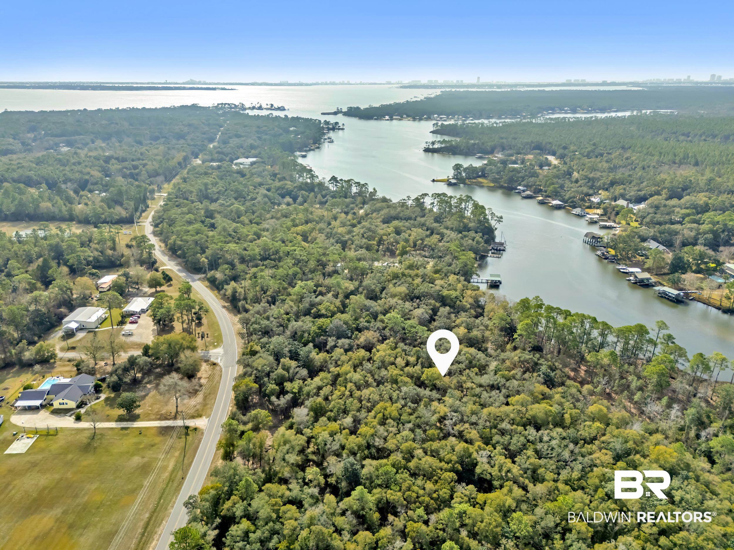 0 County Road 97 Elberta, AL 36530 - Photo 20 of 29 Drone / aerial view of a heavily wooded area and a nearby body of water