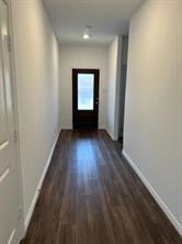 719 Biscay Way Princeton, TX 75407 - Photo 2 of 24 a view of an empty room and wooden floor