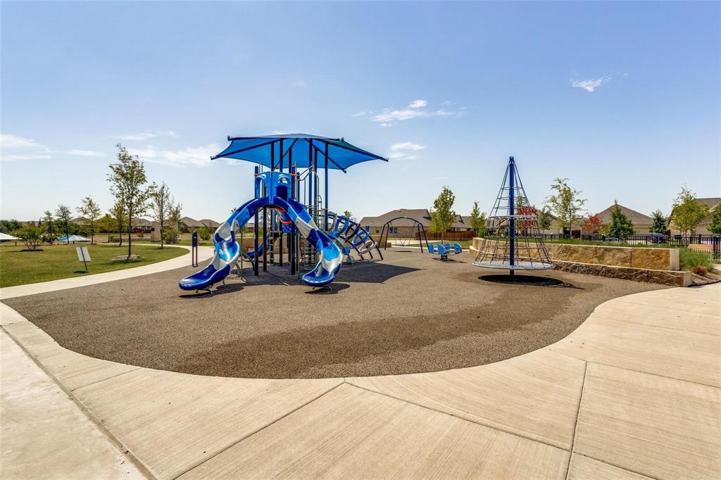 719 Biscay Way Princeton, TX 75407 - Photo 22 of 24 a view of a park with swings