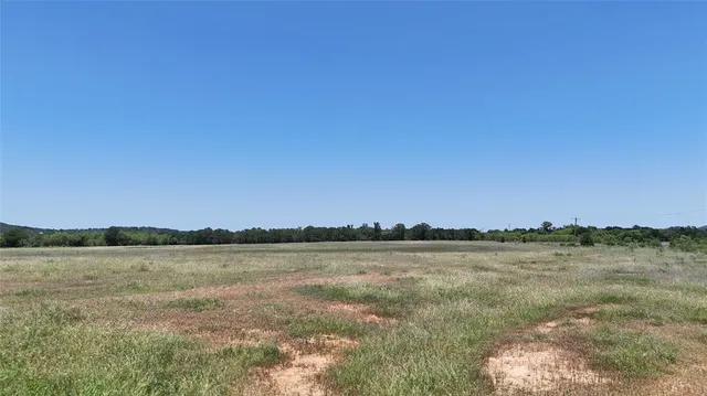 a view of a lake and sunset