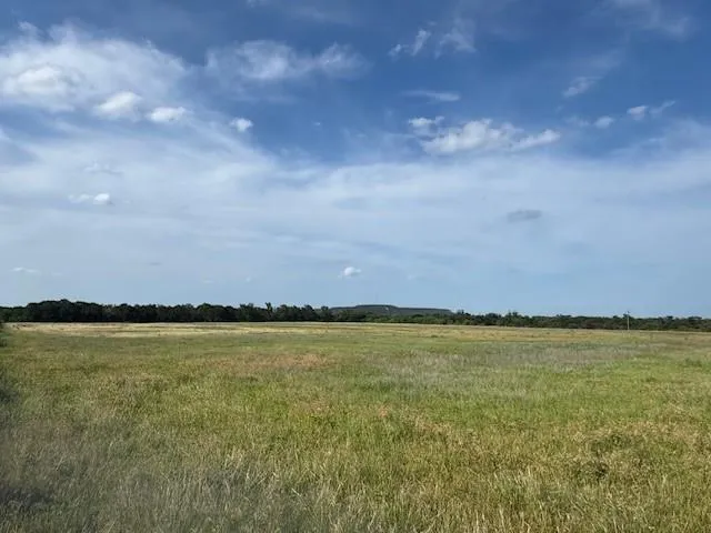a view of an ocean and sunset