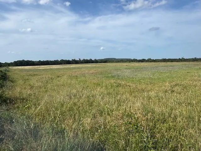 a view of an ocean and mountain