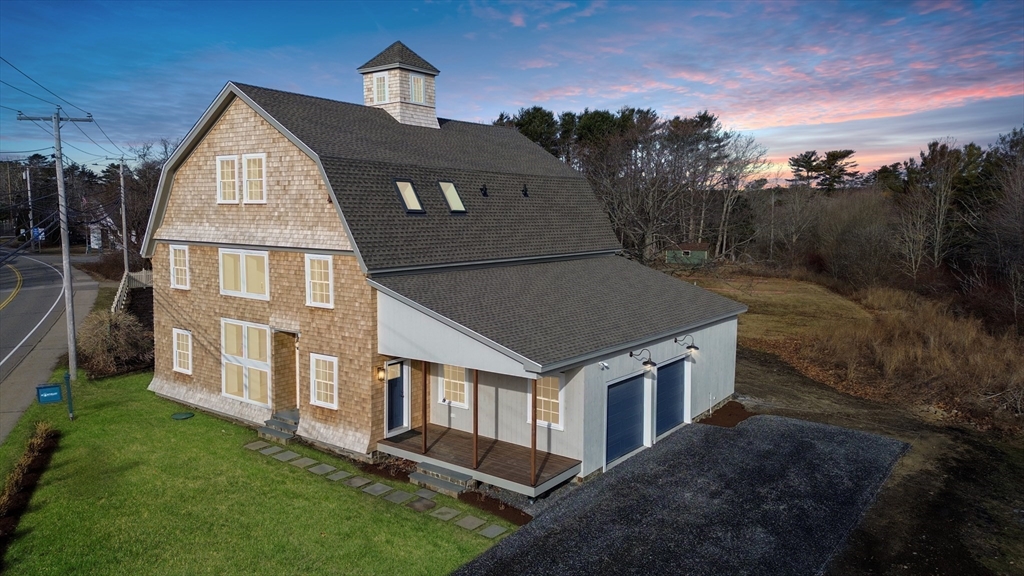7 Justin Circle York, ME 03909 - Photo 2 of 36 a front view of a house with a yard