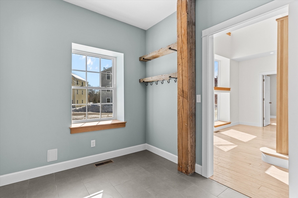 7 Justin Circle York, ME 03909 - Photo 3 of 36 an empty room with windows