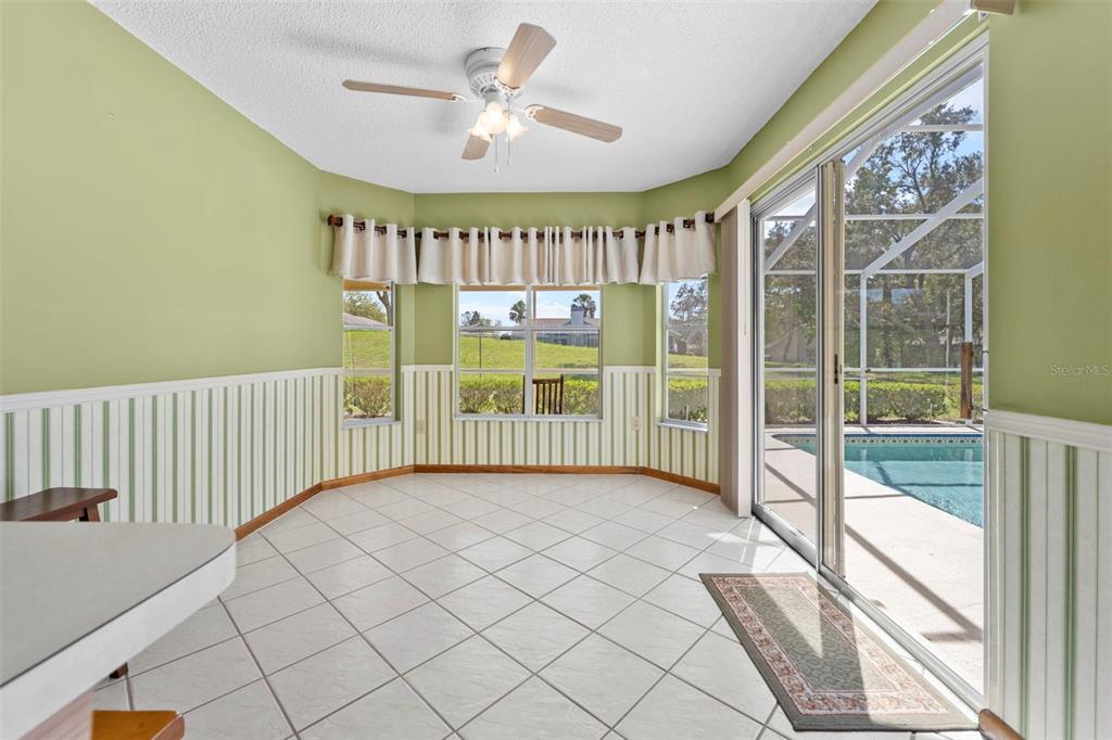1446 Cornell Avenue Spring Hill, FL 34609 - Photo 13 of 39 a view of an entryway with a floor to ceiling window