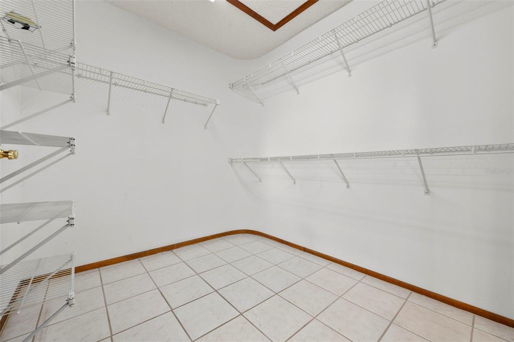 1446 Cornell Avenue Spring Hill, FL 34609 - Photo 22 of 39 a view of a room with racks on the wall