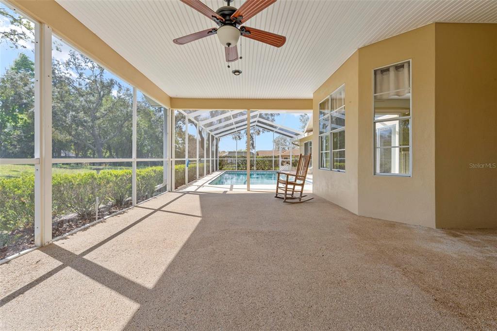 1446 Cornell Avenue Spring Hill, FL 34609 - Photo 31 of 39 a view of an empty room with a balcony