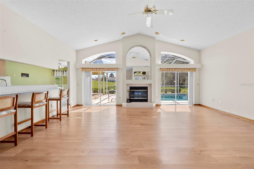 1446 Cornell Avenue Spring Hill, FL 34609 - Photo 8 of 39 a view of livingroom with furniture window and wooden floor
