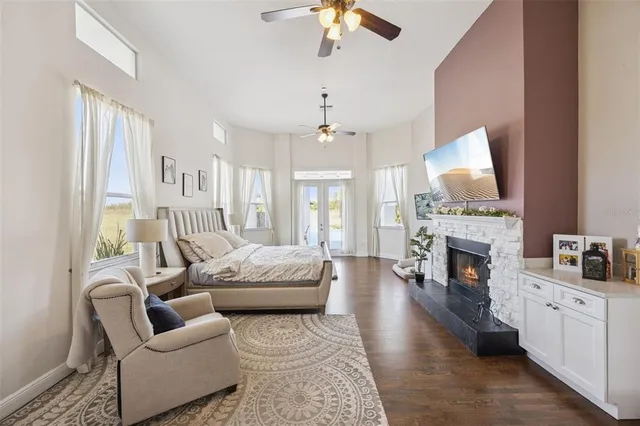 a bedroom with a bed and a table in it