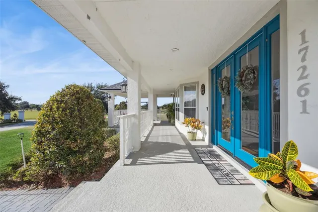 a view of a living room and hardwood floor