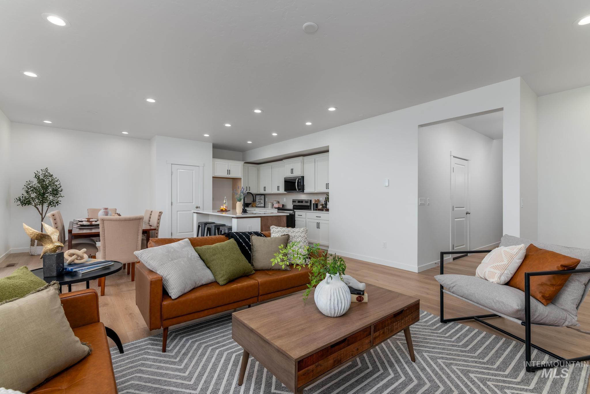 14726 Wing Spread Drive Caldwell, ID 83607 - Photo 5 of 35 Living room with recessed lighting and light wood-style floors